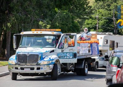 Cross Towing truck carrying a musician performing during the 2020 traveling PorchFest